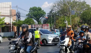Pak Ogah, Dilema Antara Macet dan Dibutuhkan